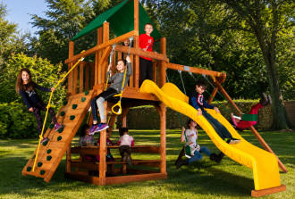 Rainbow Play Systems NJ cedar swing set installed in a New Jersey backyard